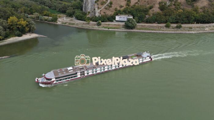 The River Cruise Ship Serenade Sails on the Danube - 4K Drone video