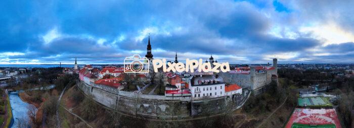 Winter Tallinn Panoramic View With a Drone Experience the breathtaking beauty of Tallinn in winter with this stunning aerial panoramic view. Captured by a drone, this image showcases the historic Old Town, its medieval towers, rooftops.
