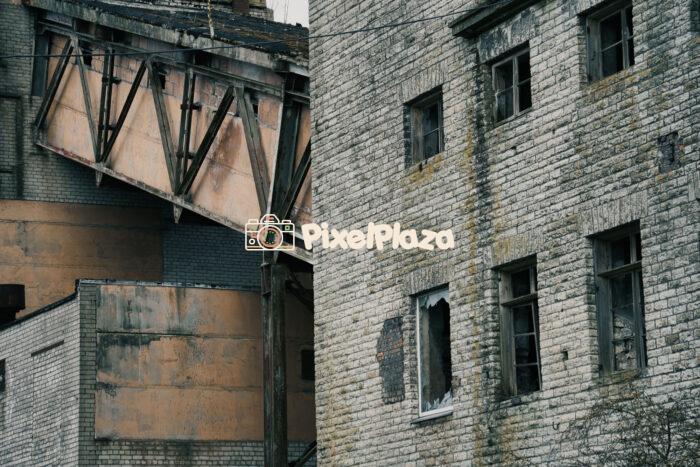 Abandoned Industrial Building with Broken Windows