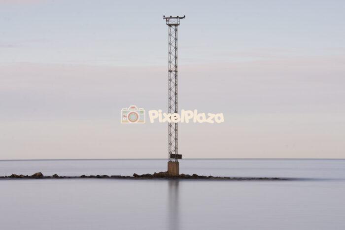 Isolated Navigation Tower in Calm Seascape
