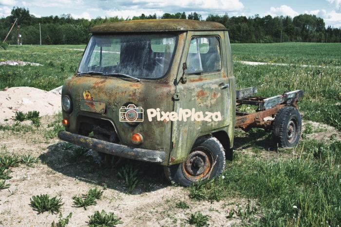 Abandoned Rusty Soviet-Era Truck UAZ in Rural Field Abandoned Rusty Soviet-Era Truck UAZ in Rural Field
