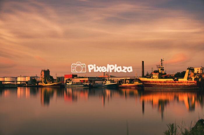 Fishing Vessels at Ventspils Port During Golden Hour, Latvia
