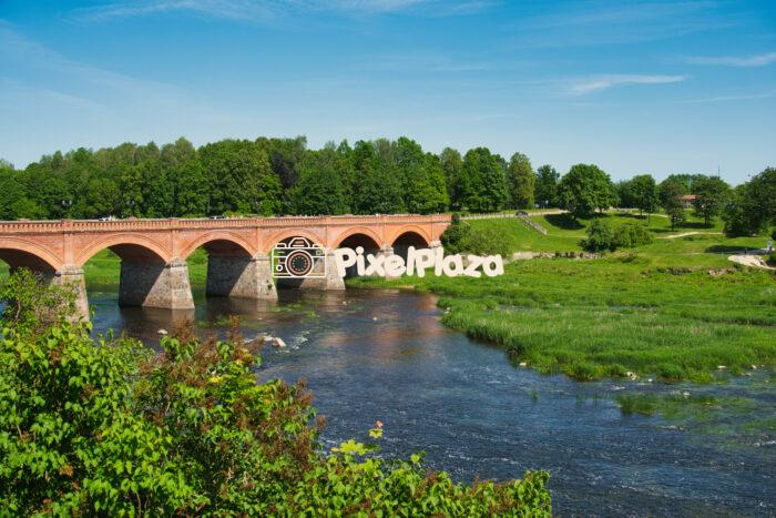 Historic Brick Bridge Over the Venta River in Kuldīga, Latvia Historic Brick Bridge Over the Venta River in Kuldīga, Latvia
