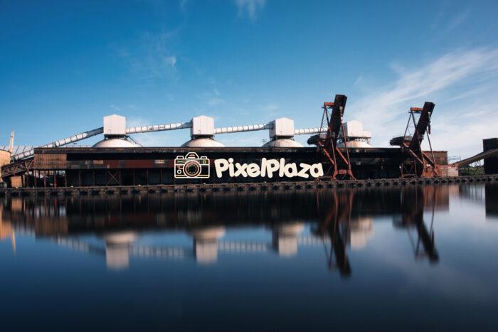 Industrial Port Facility Reflected in Calm Water - Ventspils, Latvia