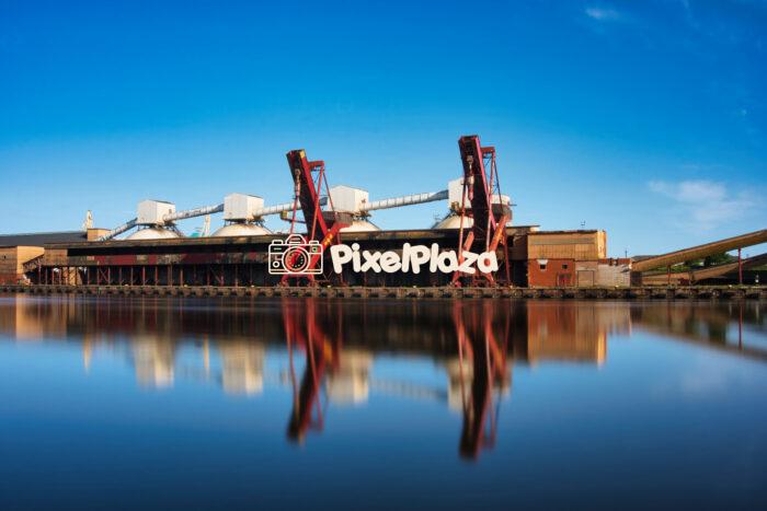 Industrial Port Scene at Ventspils, Latvia - Reflections on Still Water Industrial Port Scene at Ventspils, Latvia - Reflections on Still Water