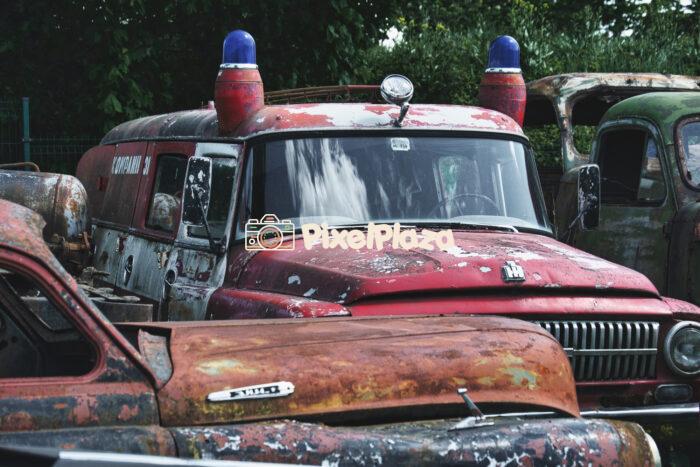 Abandoned Fire Truck - Rusty Retro Emergency Vehicle in Junkyard