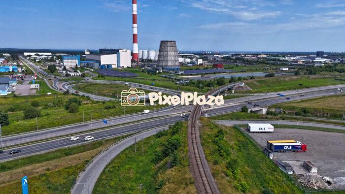 Aerial Hyperlapse of Industrial Zone and Transportation Infrastructure in Tallinn, Estonia - Summer Day 2025