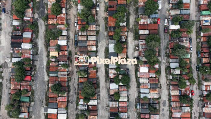 Aerial View of Old Metal Garages in Urban Area - Rusty Rooftops and Grid Layout Aerial View of Old Metal Garages in Urban Area - Rusty Rooftops and Grid Layout