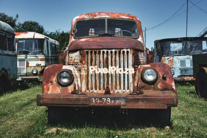 Front View of Rusty Soviet-Era Truck GAZ-51 in Abandoned Vehicle Lot