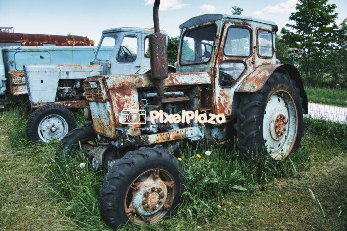 Rusty Soviet-Era Tractors Abandoned in Field – Agricultural Machinery Decay
