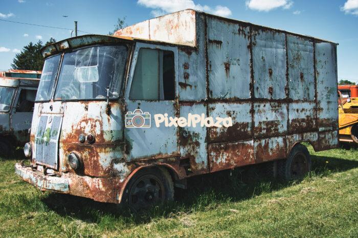 Rusty Vintage Delivery Truck TA-943 Abandoned in Field
