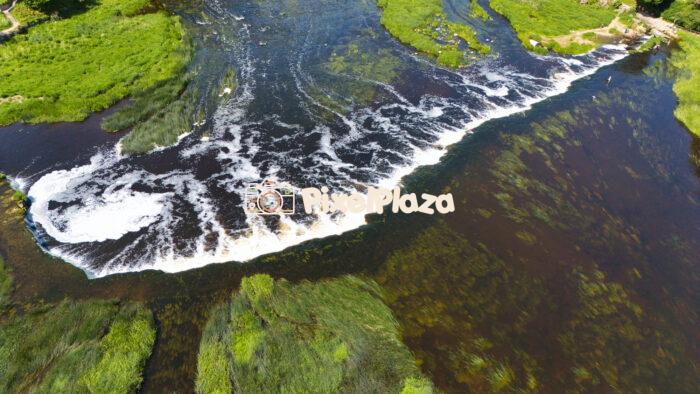 Ventas Rumba Waterfall in Kuldīga, Latvia - Europe’s Widest Waterfall - Drone View