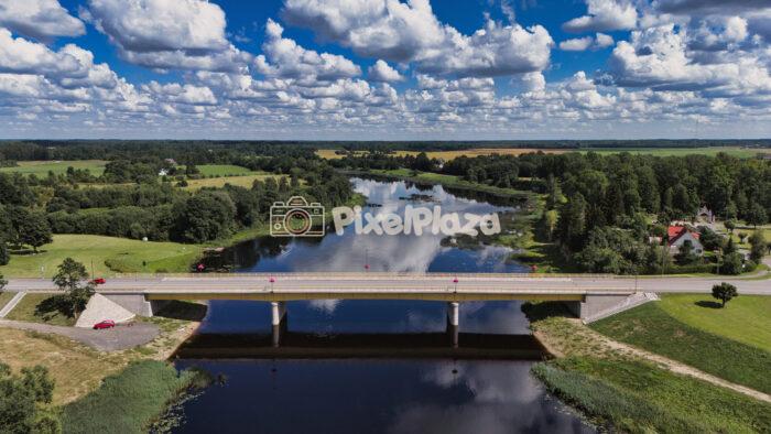 Drone View of Tori Bridge Over Pärnu River, Estonia - Scenic Summer Landscape