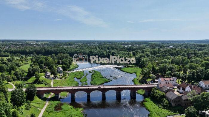 Majestic Drone Flyover of Kuldīga, Latvia - Historic Brick Bridge & Venta River in 4K