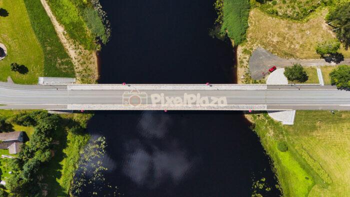 Straight Down Drone View of Tori Bridge Over Pärnu River in Pärnumaa, Estonia - Summer Countryside Scene