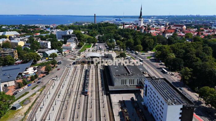 Drone View of Tallinn Railway Station and Old Town with Baltic Sea, Estonia
