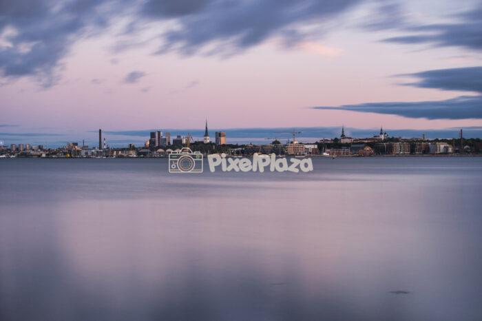 Twilight Skyline of Tallinn Over Calm Baltic Sea