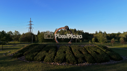 Aerial Close-Up of Maardu Landmark Sculpture at Sunset