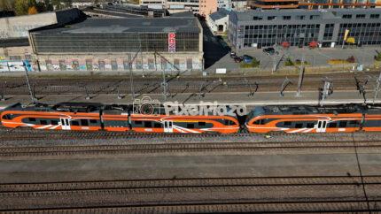 Aerial View of Balti Jaam Trains in Tallinn - 4K Drone Video