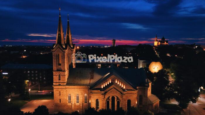 Illuminated St. Charles's Church (Kaarli Kirik) Against Tallinn Twilight Sky Illuminated St. Charles's Church (Kaarli Kirik) Against Tallinn Twilight Sky
