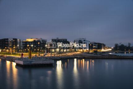 Long Exposure of Modern Coastal Apartment Buildings and Pier at Kalaranna Quarter in Tallinn, Estonia