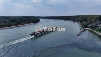 Luxury River Cruise Ship Sailing the Scenic Danube River - Wachau Valley, Austria - Drone View