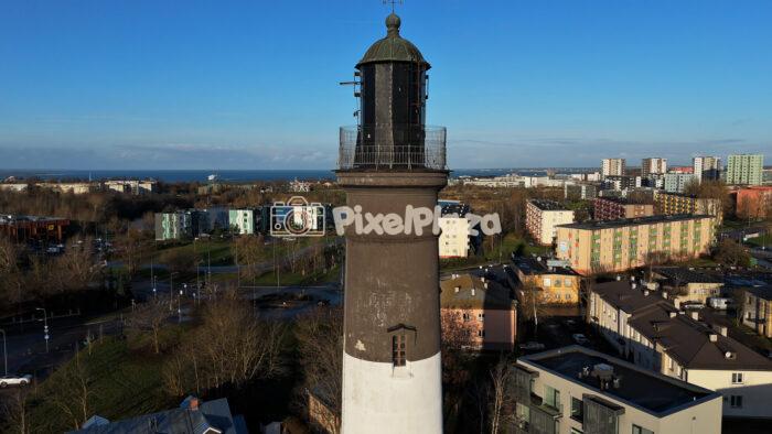Tallinn Upper Lighthouse Aerial View - Historic Beacon Over the City - 4K Drone Video