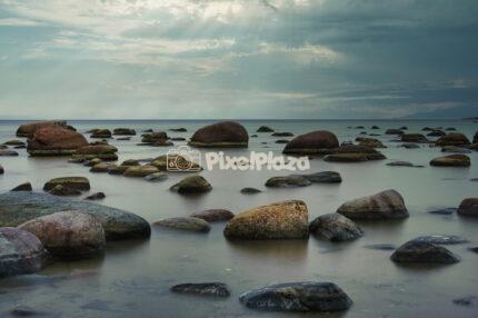 Glacial Erratic Boulders on Viimsi Coastline at Sunset