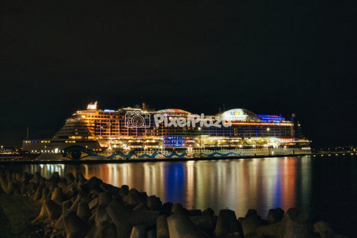 Illuminated Cruise Ship at Night in Tallinn Harbor, Estonia Illuminated Cruise Ship at Night in Tallinn Harbor, Estonia