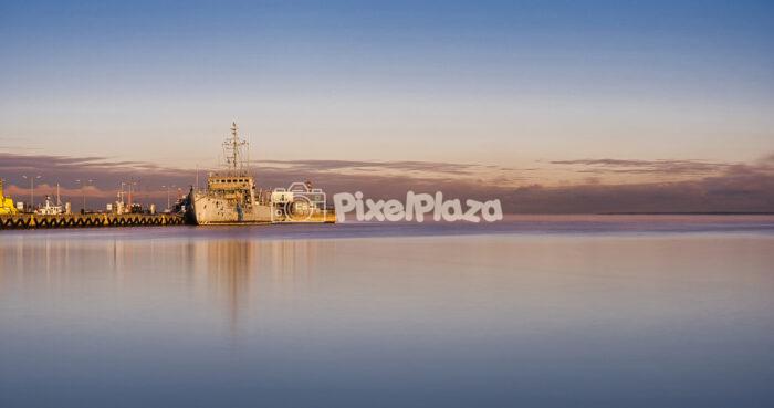 Long Exposure of Naval Ship at Harbour During Pastel Sunset Long Exposure of Naval Ship at Harbour During Pastel Sunset