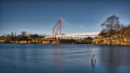 Red Suspension Pedestrian Bridge Over Pae Lake Long Exposure