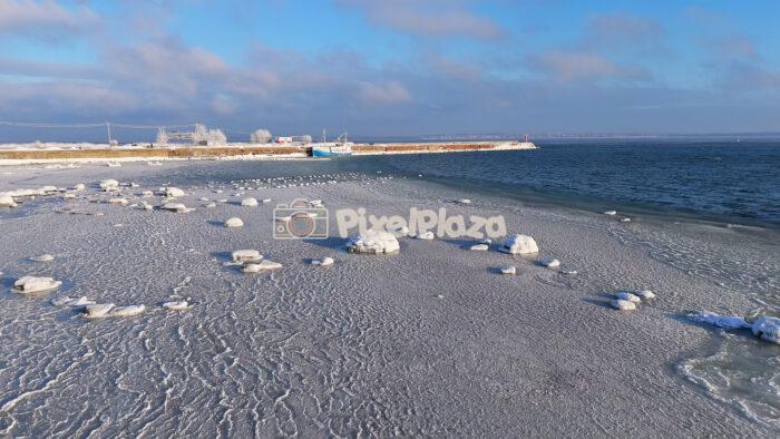 Frozen Baltic Coast at Paljassaare, Tallinn - Winter Aerial Seascape 4K Drone Video