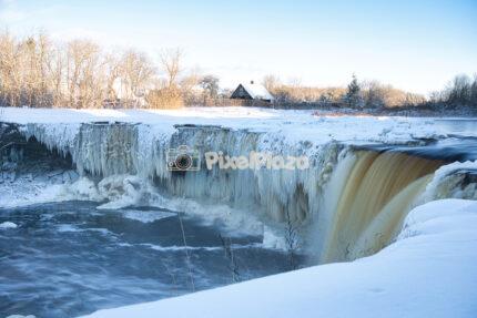 Majestic Frozen Jägala Waterfall in Estonian Winter Landscape