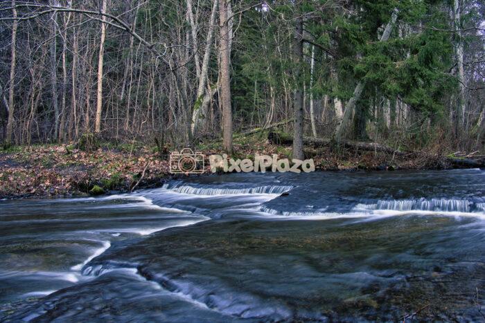 Smooth Water Flow Over Limestone Plates at Treppoja, Estonia