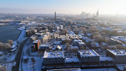 Winter Aerial Cityscape of Tallinn - Snowy Urban 4K Drone Video