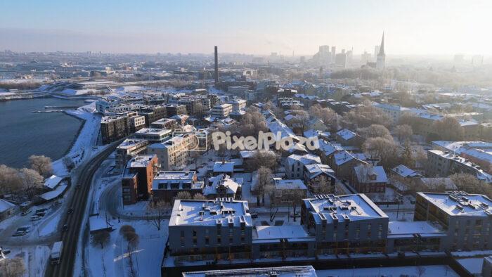Winter Aerial Cityscape of Tallinn - Snowy Urban 4K Drone Video