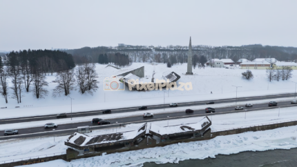 Winter Aerial View of Pirita Road and Maarjamäe Memorial, Tallinn, Estonia - 4K Drone Video