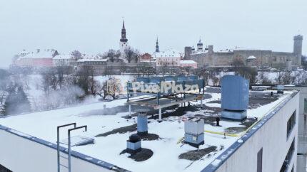 Winter Aerial View of Tallinn Old Town Skyline and Medieval Walls - 4K Drone Video