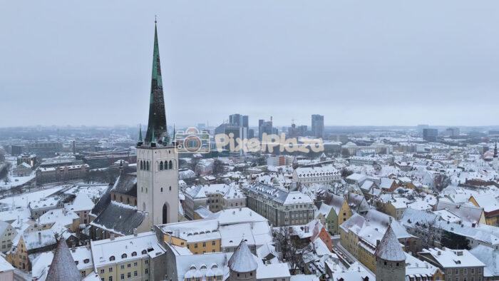 Winter Aerial of Tallinn Old Town with St Olaf’s Church - 4K Drone Video