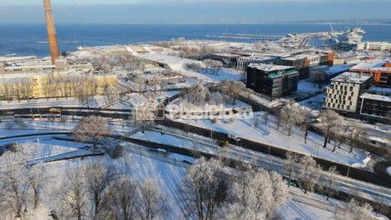 Winter View of Linnahall and Frozen Tallinn Harbour Coastline - 4K Drone Video