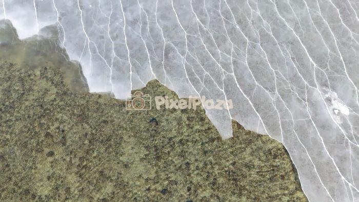 Frozen Baltic Sea Ice Patterns from Above – Winter Aerial, Tallinn, Estonia