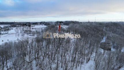 Viimsi Lighthouse Aerial in Winter Forest - Snowy Coastal Landscape, Estonia