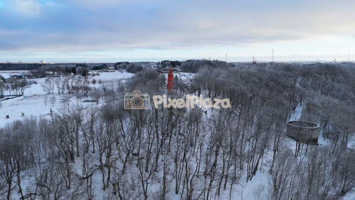 Viimsi Lighthouse Aerial in Winter Forest - Snowy Coastal Landscape, Estonia