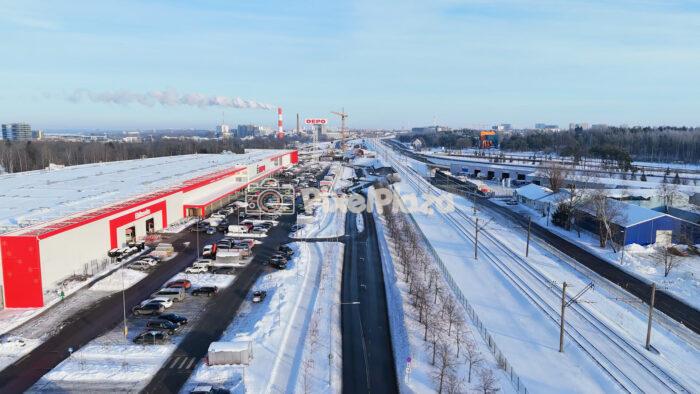 Winter Aerial View of Tallinn Industrial District with Retail Center, Railway and Highway