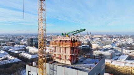 Winter Drone Aerial of Construction Site and Tallinn Old Town Skyline, Estonia
