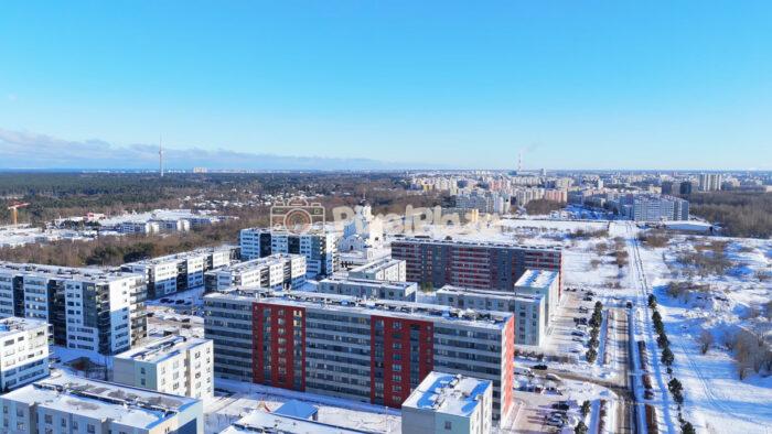 Winter Drone View of Lasnamäe Residential District, Tallinn Cityscape with Snowy Apartment Blocks
