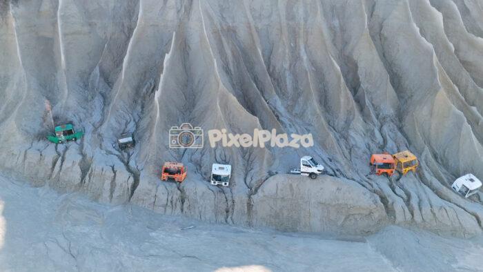 Abandoned Car Wreck Cabins on Clay Cliffs at Rummu Quarry Estonia Drone