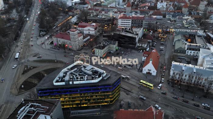 Aerial Drone View of Tallinn City Center at Dusk with Traffic and Historic Old Town
