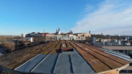 Aerial Drone View of Telliskivi Creative City Roof with Tallinn Old Town Skyline, Estonia