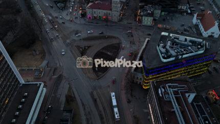 Aerial Drone View of Viru Square Traffic and City Streets in Tallinn, Estonia at Dusk